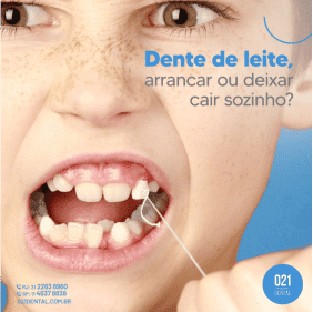 Criança retirando Dente de leite com fio dental